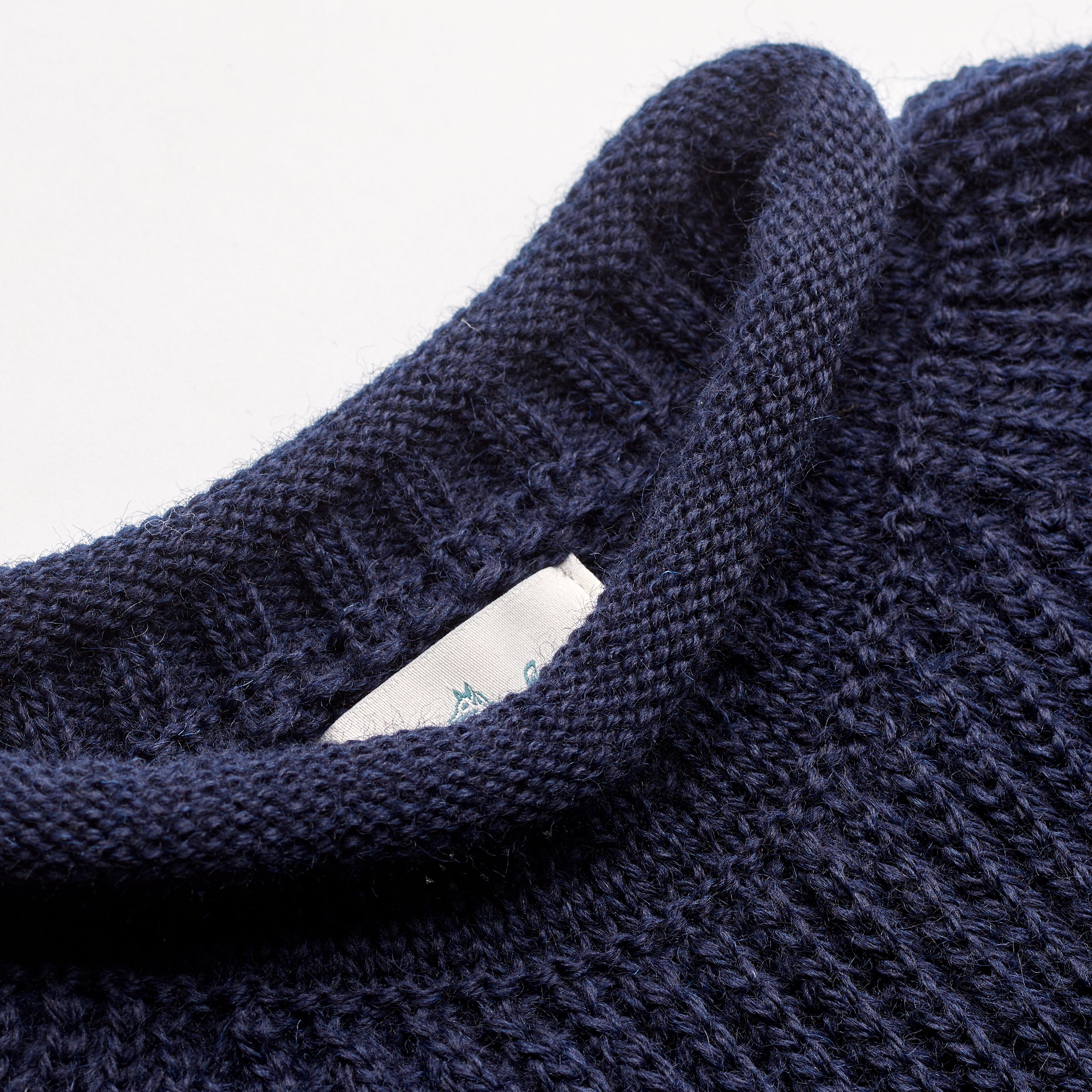 The Fisherman Ribbed Roll Neck Jumper in Navy