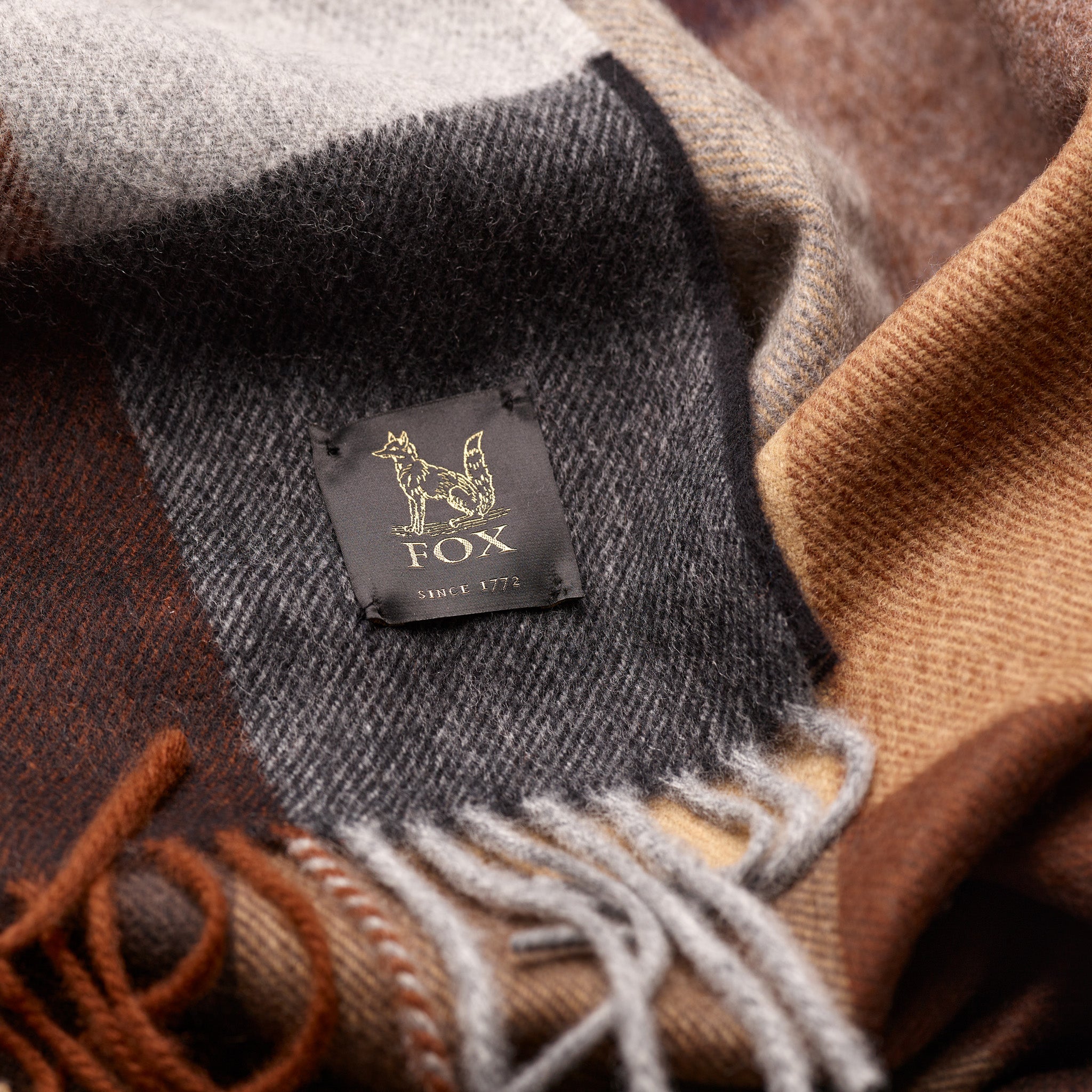 Fox woven label on brown and navy cashmere and wool check scarf