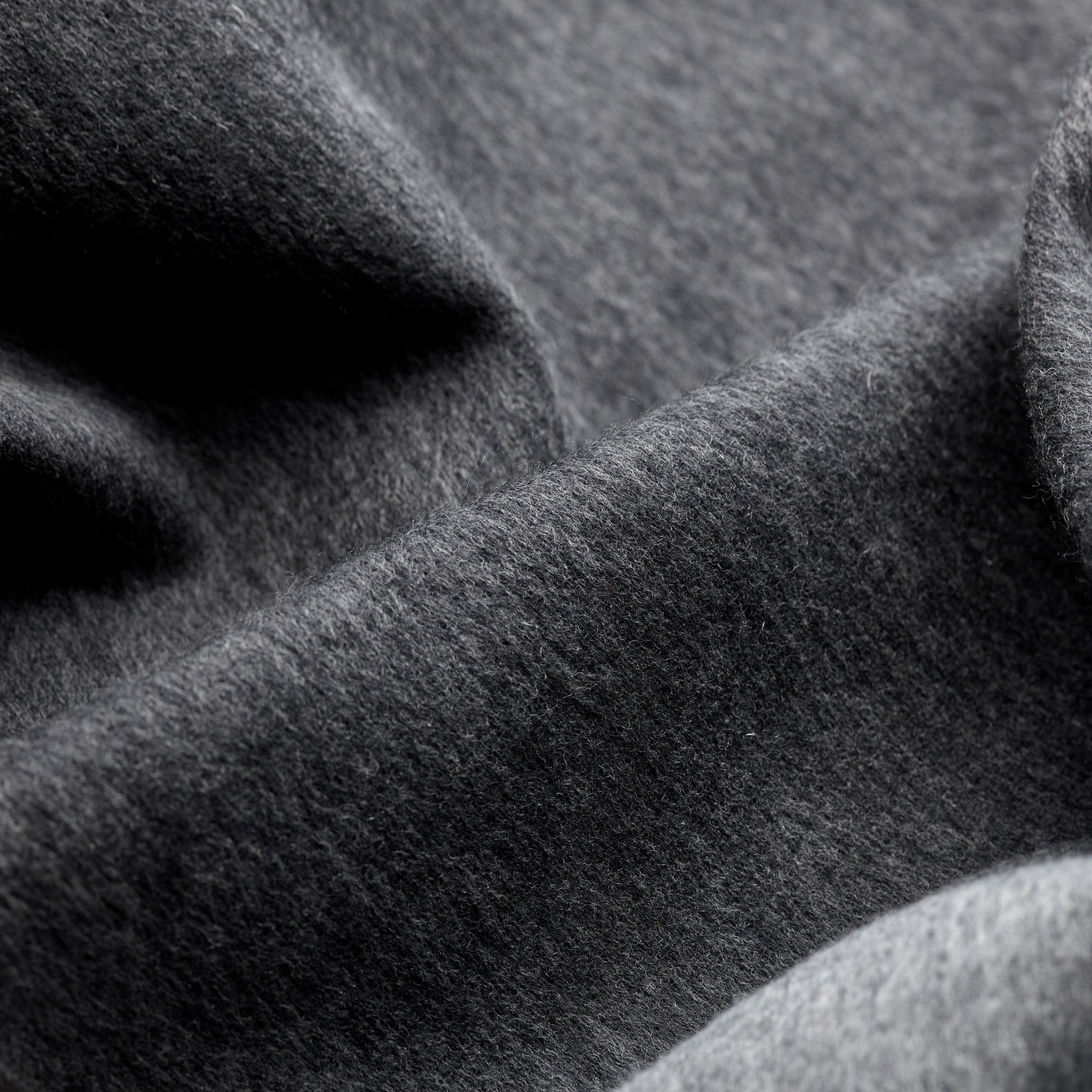 Close-up of brushed cashmere and wool cloth in grey and blue